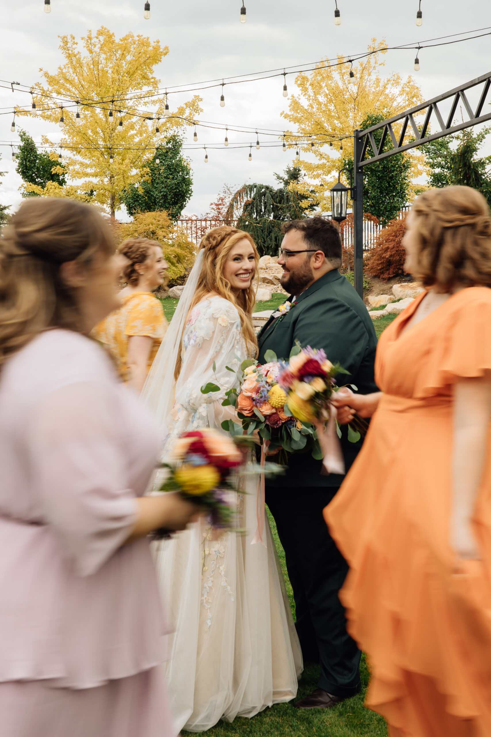 Couple smiles at their Highland Gardens wedding