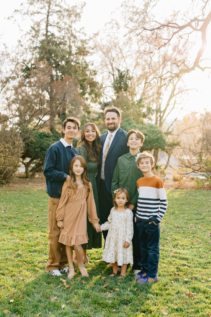 family smiles at extended family session in American Fork, Utah