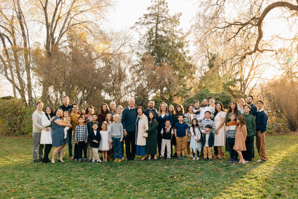 family smiles at extended family session in American Fork, Utah